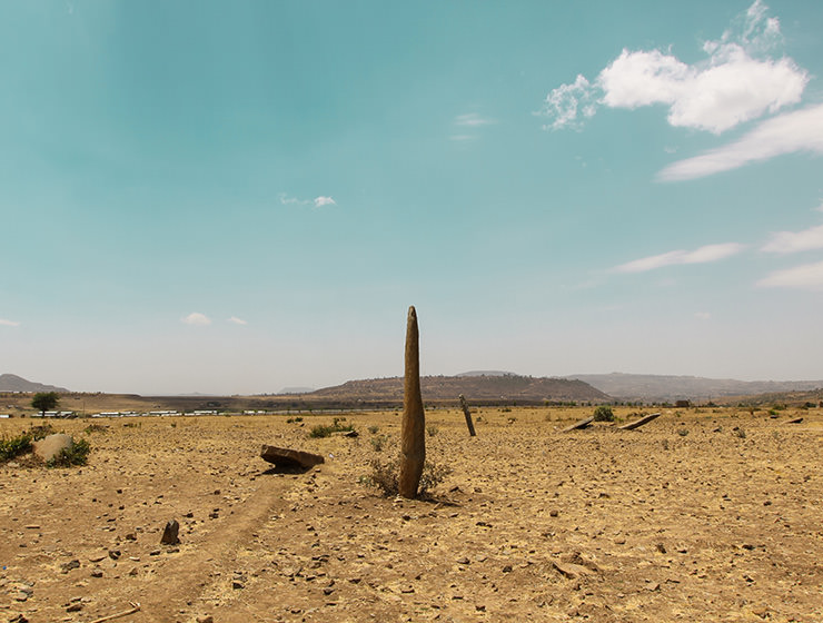 One of the monoliths standing in the desert surrounding of Gudit Stelae Field in Aksum, Ethiopia, photo by Ivan Kralj