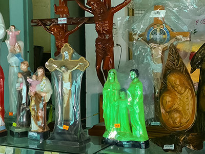 Glow-in-the-dark Holy Family, the phosphorescent souvenir sculpture in the shop at Christ the King monument in Vung Tau, Vietnam, photo by Ivan Kralj