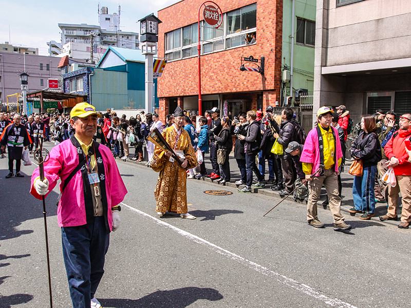 The priest is heading the penis parade at Kanamara Matsuru, festival of the iron penis, in Kawasaki, Japan, photo by Ivan Kralj