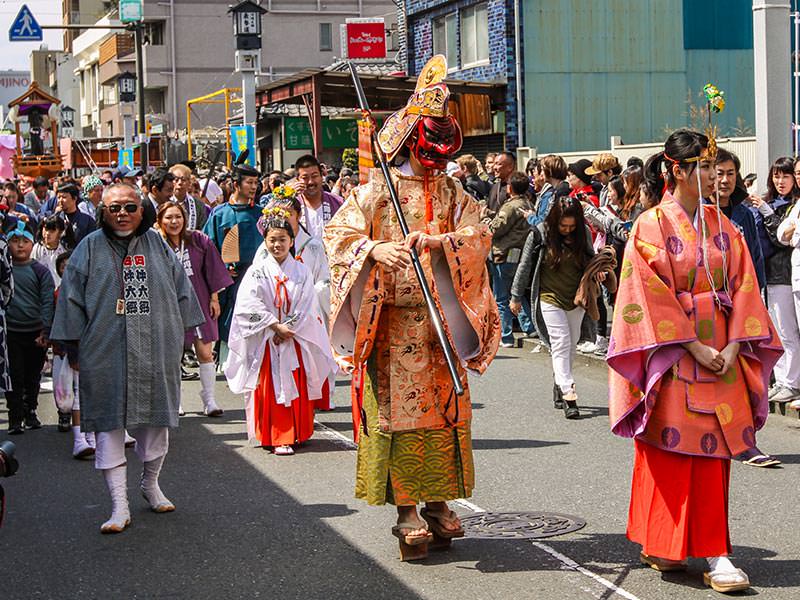 Members of the shrine and priestesses walking in the penis parade at Kanamara Matsuru, festival of the iron penis, in Kawasaki, Japan, photo by Ivan Kralj