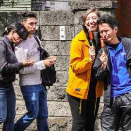 A couple posing with penis-shaped lollipops at Kanamara Matsuru, festival of the iron penis, in Kawasaki, Japan, photo by Ivan Kralj