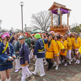 Group of worshippers carrying the mikoshi, portable shrine at Kanamara Matsuru, festival of the iron penis, in Kawasaki, Japan, photo by Ivan Kralj