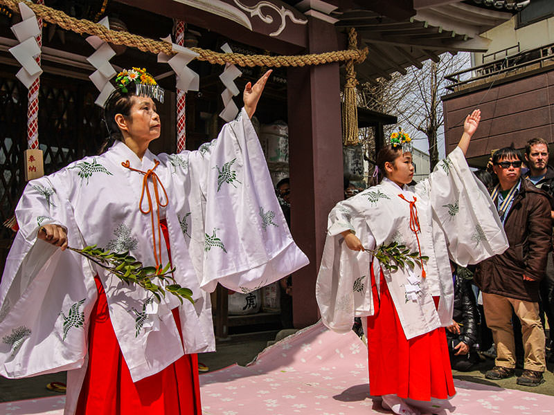 Priestesses performing the ritual of transferring the spirits into mikoshi at Kanamara Matsuru, festival of the iron penis, in Kawasaki, Japan, photo by Ivan Kralj