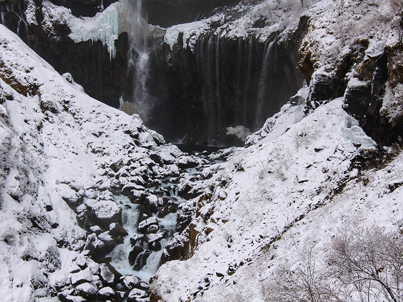 Magnificent view of the Kegon Falls, Japan, in the snowy surrounding