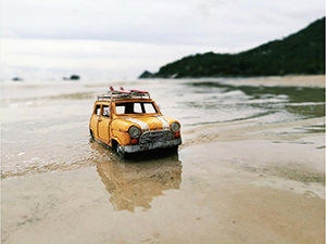 One of Kim Leuenberger's vintage toy cars at the beach, photo by Kim Leuenberger.