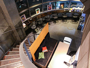 ART'n'SHELTER hostel lobby photographed from above, with staircase and seating areas for reading books or chilling out, in Tokyo, Japan, photo by Ivan Kralj
