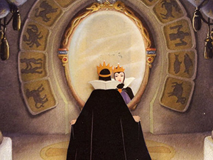 From the cartoon, queen from the Snow White fairytale standing in front of the mirror