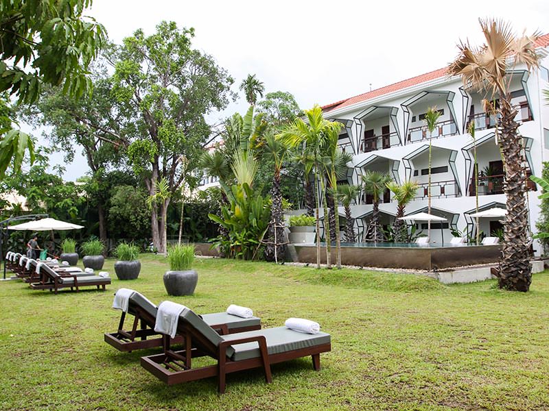 Garden and silver swimming pool at Jaya House River Park hotel, in Siem Reap, Cambodia, photo by Ivan Kralj