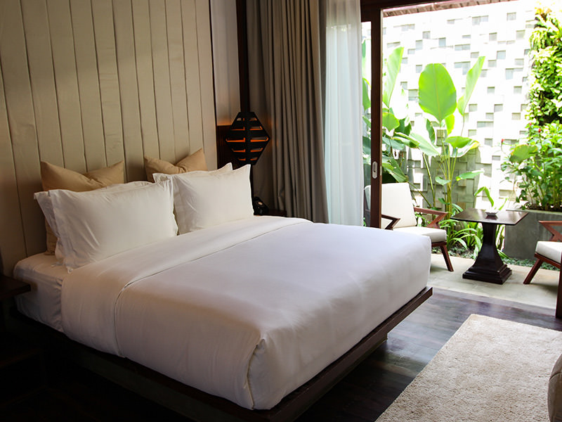Bed in Junior Suite of Jaya House River Park hotel, in Siem Reap, Cambodia, photo by Ivan Kralj