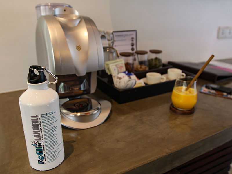 Coffee and tea making facilities, with refillable water bottle in Junior Suite of Jaya House River Park hotel, in Siem Reap, Cambodia, photo by Ivan Kralj