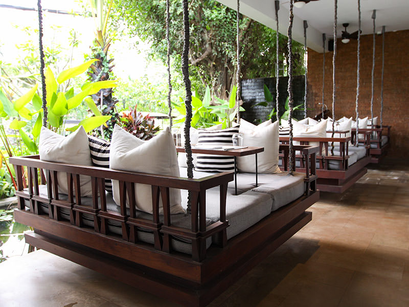 Swinging chair at the restaurant of Jaya House River Park hotel, in Siem Reap, Cambodia, photo by Ivan Kralj