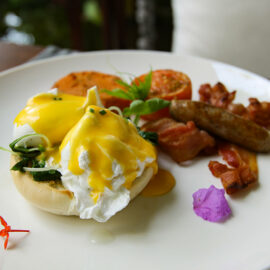 Eggs Florentine served for breakfast on the swinging chair at the restaurant of Jaya House River Park hotel, in Siem Reap, Cambodia, photo by Ivan Kralj