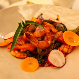 Stir fried squid and prawn with green peppercorn served for dinner at the restaurant of Jaya House River Park hotel, in Siem Reap, Cambodia, photo by Ivan Kralj