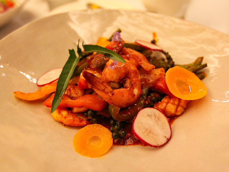 Stir fried squid and prawn with green peppercorn served for dinner at the restaurant of Jaya House River Park hotel, in Siem Reap, Cambodia, photo by Ivan Kralj