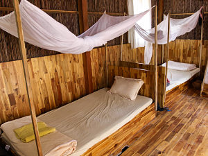Island Life Hostel dormitory with mosquito-nets protected beds, on Phu Quoc Island, Vietnam, photo by Ivan Kralj