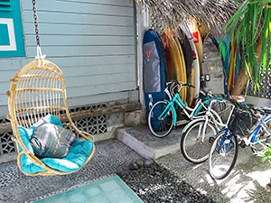 Swinging chair, bicycles and surfboards at Kosta Hostel, in Seminyak, Bali, Indonesia, photo by Ivan Kralj