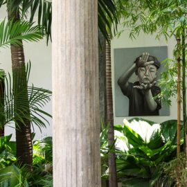 Painting by Christian Develter surrounded by greenery at Rambutan Resort Phnom Penh, Cambodia, photo by Ivan Kralj
