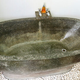 Stone bathtub at the balcony in Rambutan Resort Siem Reap, Cambodia, photo by Ivan Kralj