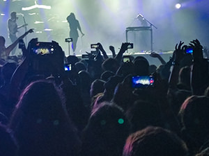 The flashing mobile phone screens in the audience, filming the concert of The Naked and Famous at Sziget Festival 2017 in Budapest, Hungary, photo by Ivan Kralj