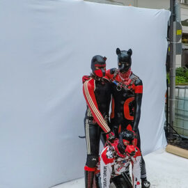 Three human puppies posing for a photo at Folsom Europe Street Fair, the biggest European gay fetish event, in Berlin, Germany, photo by Ivan Kralj
