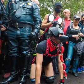 Human puppy with sausages in his snout, at Folsom Europe Street Fair, the biggest European gay fetish event, in Berlin, Germany, photo by Ivan Kralj