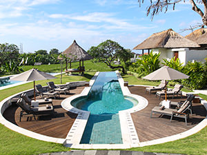 Sunbeds next to the swimming pool at Samata Resort in Sanur, one of the answers to where to stay in Bali, Indonesia, photo by Ivan Kralj