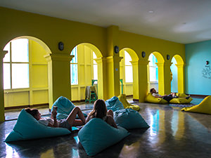 Guests resting on bean bags in a lounge at Wonderloft, one of the best hostels of Java, in Jakarta, Indonesia, photo by Ivan Kralj