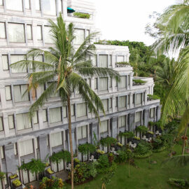 Exterior of Hyatt Regency Yogyakarta hotel, giant palms in front of the building, in Jogjakarta, Indonesia, photo by Ivan Kralj