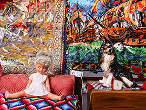 Plastic doll and porcelain dog decorating the typical Romanian late 20th century flat in Romanian Kitsch Museum in Bucharest, Romania, photo by Ivan Kralj.