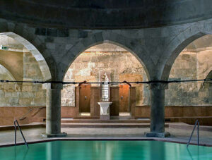 16th century Rudas Baths main pool surrounded by pillars holding the dome, in Budapest, Hungary, photo by Ivan Kralj
