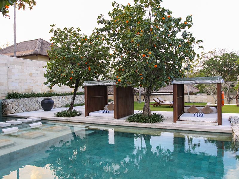 Sheltered daybeds at the main swimming pool at the Balé resort in Nusa Dua, Bali, Indonesia - great place to chill on your Bali honeymoon, photo by Ivan Kralj