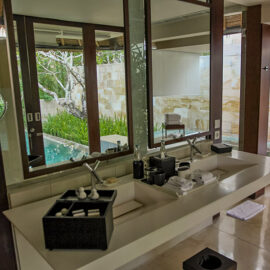 The bathroom with mirrors reflecting the private swimming pool in front of the private pavilion at the Balé resort in Nusa Dua, Bali, Indonesia, photo by Ivan Kralj