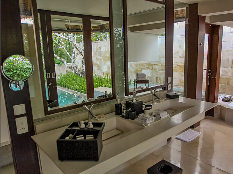 The bathroom with mirrors reflecting the private swimming pool in front of the private pavilion at the Balé resort in Nusa Dua, Bali, Indonesia, photo by Ivan Kralj
