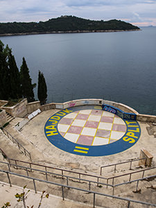 The amphitheater in the abandoned Hotel Belvedere Dubrovnik, that was used as a filming location for the battle of Oberyn and Mountain in "Game of Thrones" series - crest of House of Baratheon was repainted with the crest of Hajduk football club, photo by Ivan Kralj