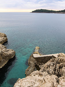 Stairs leading into the sea in front of the abandoned Hotel Belvedere Dubrovnik, Croatia, photo by Ivan Kralj