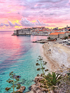 The colorful sunset over the turquoise Bane Beach and fort walls of Dubrovnik, Croatia, received more than 20.000 likes on the official Instagram account of Croatian National Tourist Board, making it the second most liked image in 2017, photo by Ivan Kralj
