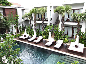 The swimming pool with sun loungers at Jaya House RiverPark hotel in Siem Reap, Cambodia, photo by Ivan Kralj
