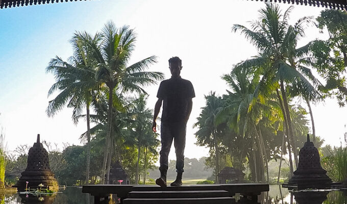 The silhouette of Pipeaway blogger Ivan Kralj with palms in the background at Hyatt Regency Yogyakarta, Java, Indonesia, photo by Ivan Kralj