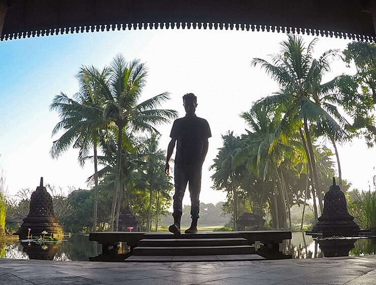 The silhouette of Pipeaway blogger Ivan Kralj with palms in the background at Hyatt Regency Yogyakarta, Java, Indonesia, photo by Ivan Kralj