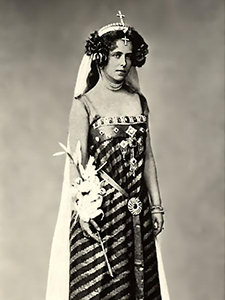 Black and white photograph of Princess Marie posing for Cosmopolitan Magazine in 1898, with special headpiece accessory containing two crosses