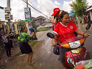 Action-style photo of people splashing the two ladies on a scooter with water, during the Khmer New Year celebration in Battambang, Cambodia. The photograph by Ivan Kralj made it to the selection of the best travel photos of the year 2017 at Fotorama's art photography festival in Kragujevac, Serbia