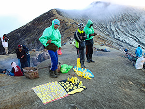 Miners selling figurines made of sulfur excavated at Kawah Ijen Volcano, East Java, Indonesia, photo by Ivan Kralj