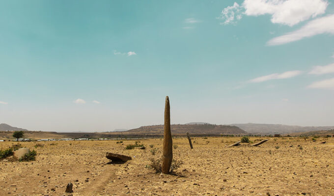 One of the monoliths standing in the desert surrounding of Gudit Stelae Field in Aksum, Ethiopia, photo by Ivan Kralj