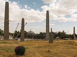 Obelisks standing at the Northern Stelae Field with the Church of St. Mary of Zion in the background, in Aksum, Ethiopia, photo by Ivan Kralj