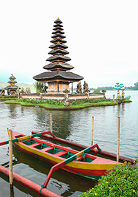 Pura Ulun Danu Beratan temple pagoda on lake in Bali, Indonesia, reachable only by the traditional boat in front, photo by Ivan Kralj