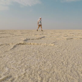 Pipeaway blogger Ivan Kralj walking over the salt plains of Lake Assale, Danakil Depression, Ethiopia, the hottest place on Earth, photo by Ivan Kralj