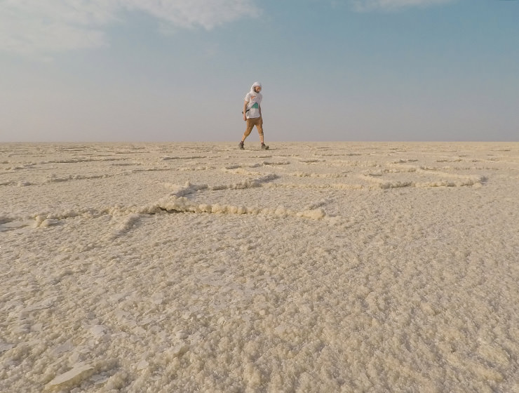 Pipeaway blogger Ivan Kralj walking over the salt plains of Lake Assale, Danakil Depression, Ethiopia, the hottest place on Earth, photo by Ivan Kralj