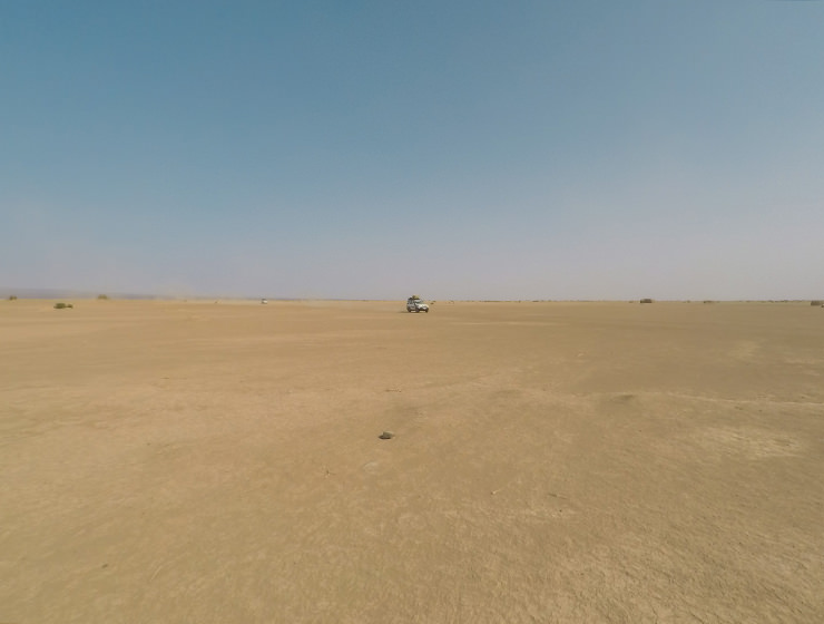 Toyota Land Cruiser riding through the desert in Danakil Depression, Ethiopia, the hottest place on Earth, photo by Ivan Kralj