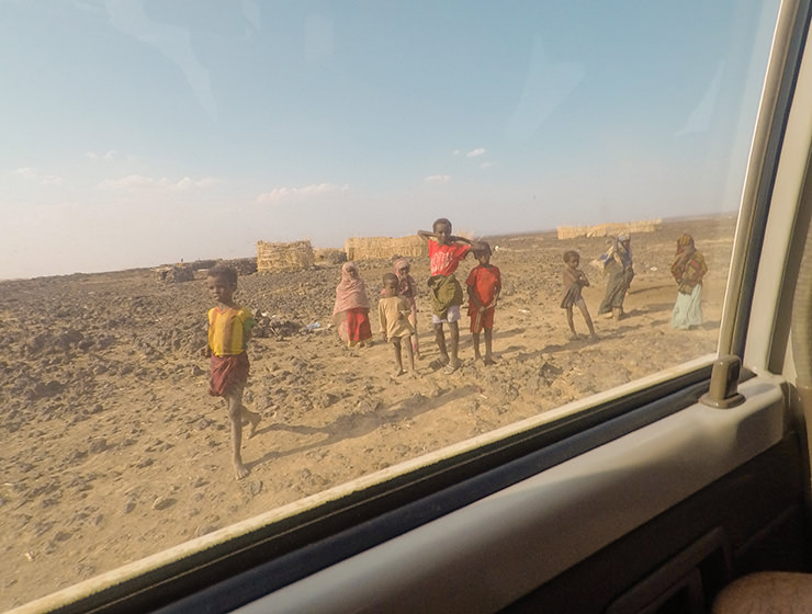 Local children in the desert, as seen from the car, in Danakil Depression, Ethiopia, the hottest place on Earth, photo by Ivan Kralj