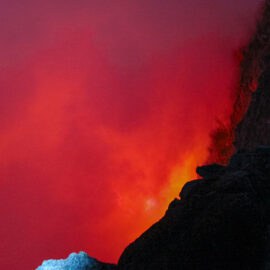 One of the world's five permanent lava lakes hiding under the cloud of smoke, at Erta Ale volcano in Danakil Depression, Ethiopia, the hottest place on Earth, photo by Ivan Kralj